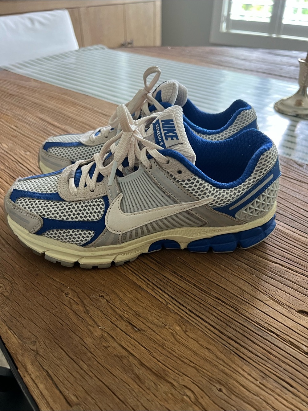 Nike size 8 Women's White and Blue Vomero  Sneakers. Slightly used. No box